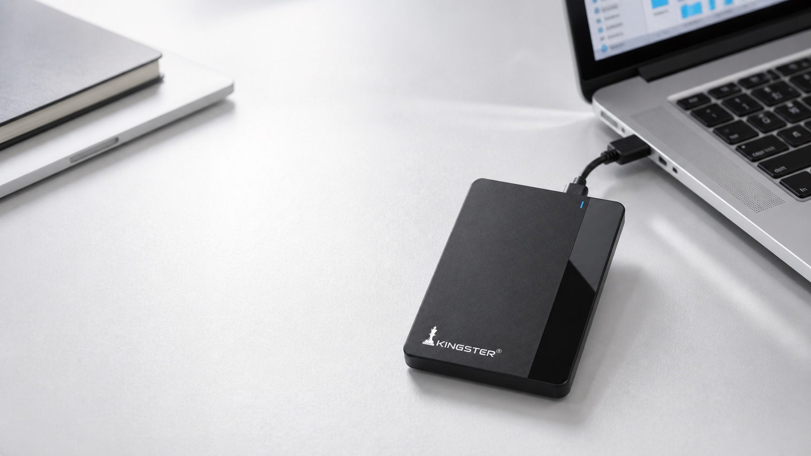 KINGSTER drive connected to a modern laptop